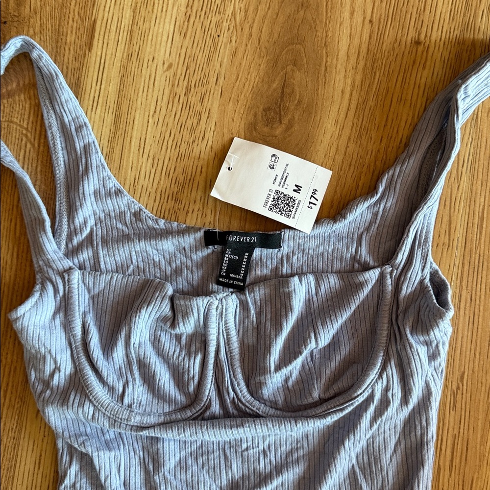 Baby blue body suit from Forever 21. Never worn. Size M